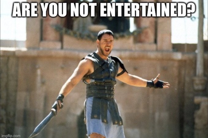 The image shows Russell Crowe as Maximus from *Gladiator*, screaming defiantly with sword in hand, overlaid with the text "ARE YOU NOT ENTERTAINED?"—perfectly capturing the post's triumphant response to skeptics who doubted the poster's EasyA strategy worked.
