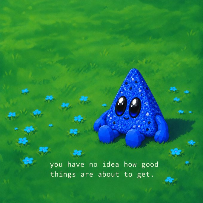 A cute, blue, glittery triangle-shaped character with big eyes sitting in a grassy field with small blue flowers, captioned 'you have no idea how good things are about to get.'