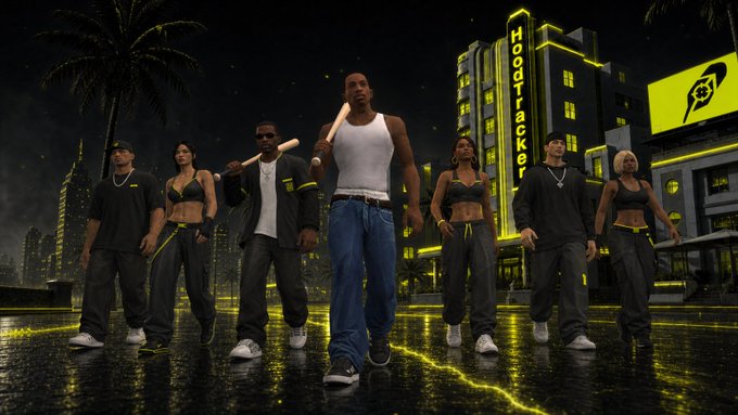 A group of video game characters in urban streetwear stands together in a neon-lit nighttime city scene with a building labeled 'HOODracker' in the background.