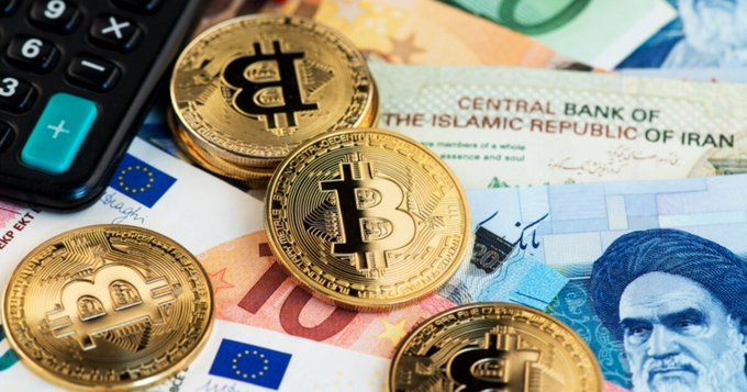 Gold Bitcoin tokens rest atop Iranian rial banknotes issued by the Central Bank of the Islamic Republic of Iran, alongside a calculator and what appears to be a euro note, visually symbolizing the country's shift toward cryptocurrency for cross-border trade amid U.S. sanctions.