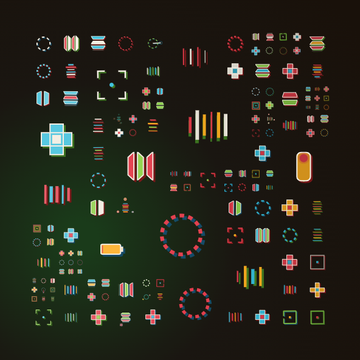 A dark sprite sheet or game asset collection featuring various colorful pixel art icons, shapes, capsules, and geometric designs in red, blue, yellow, and green.