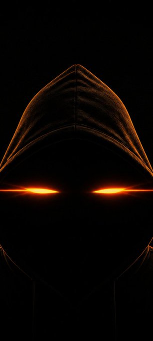 A dark, hooded figure with piercing glowing orange eyes emerges from shadows, echoing the post's tone of cryptic return after a break. The fiery gaze mirrors the Bitcoin-orange theme tied to the author's return to the crypto timeline and their pivot toward gold.