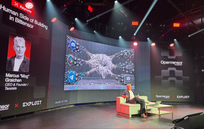 A keynote stage at an event featuring Marcus 'Mog' Graichen, CEO & Founder of Tensorists, presenting on 'The Human Side of Building in Bittensor' alongside OpenTensor Foundation logos.