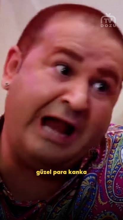 A person with a shaved head and a patterned shirt makes an exaggerated surprised expression, with yellow text reading 'güzel para kanka' and a 'TV DOĞU' watermark visible.