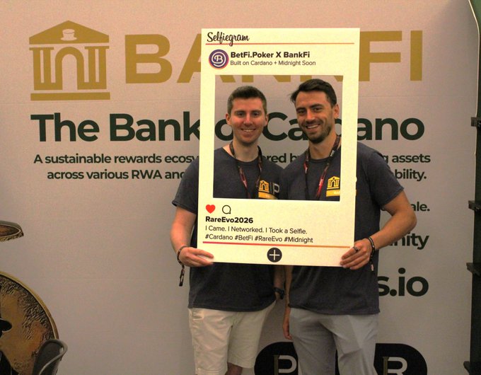 Two smiling men pose together at Rare Evo 2026, holding up a large Selifiegram frame that reads "BetFi.Poker X BankFi — Built on Cardano + Midnight Soon" and is captioned "I Came. I Networked. I Took a Selfie." The BankFi Cardano backdrop behind them and the event hashtags (#Cardano #BetFi #RareEvo #Midnight) tie directly to the post's mention of "Cardano legends" worth greeting at the conference.