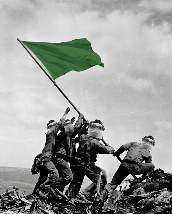 A black-and-white photograph styled like the iconic 'Raising the Flag on Iwo Jima,' showing several soldiers raising a green flag, but with their faces pixelated for anonymity.