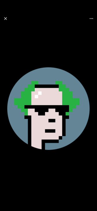 A pixel art character with green spiky hair on a dark circular background, displayed in a minimalist interface with close and menu icons.