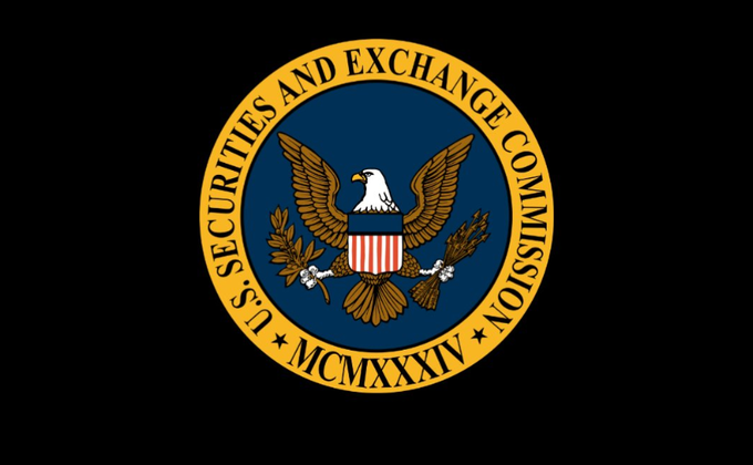 The image displays the official seal of the U.S. Securities and Exchange Commission, featuring a bald eagle and the founding year "MCMXXXIV" (1934). This seal relates to the post because the SEC had planned a meeting to discuss crypto-related investment contracts, which has now been postponed, leaving the crypto community awaiting a new date.