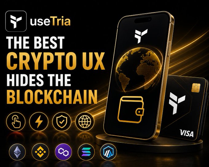 A promotional banner for useTria cryptocurrency app featuring a smartphone displaying a globe and wallet icon alongside a Visa card, with text reading 'THE BEST CRYPTO UX HIDES THE BLOCKCHAIN' and showing various crypto icons.