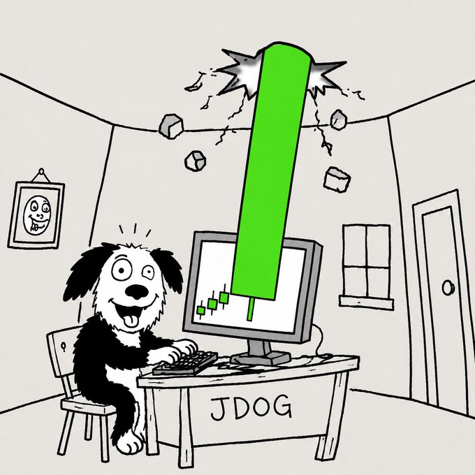 A cartoon dog sits at a desk labeled "JDOG" typing at a computer displaying a green stock chart that has crashed through the ceiling, with the tickers "MEME/NVDA" visible on the monitor—depicting the chaotic energy of the new meme-stock token. The image visually represents the post's claim of "$JDOG writing history" through the explosive, ceiling-shattering green candle symbolizing unprecedented market action.