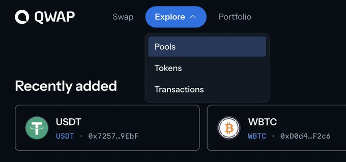 A dark-themed interface for QWAP with navigation options for Swap, Explore (showing Pools, Tokens, Transactions dropdown), and Portfolio, featuring recently added tokens USDT and WBTC.