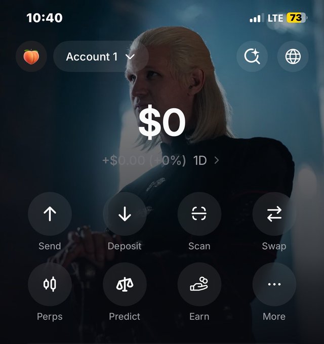 A mobile phone screenshot of a crypto wallet app showing a $0 balance on 'Account 1' with options for Send, Deposit, Scan, Swap, Perps, Predict, Earn, and More, with a Daenerys Targaryen background image.