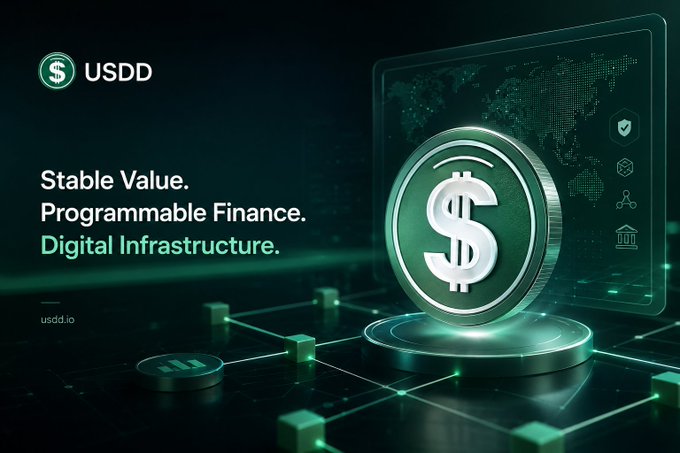 A promotional graphic for USDD stablecoin featuring a 3D silver coin with a dollar sign, world map background, and text reading 'Stable Value. Programmable Finance. Digital Infrastructure.'