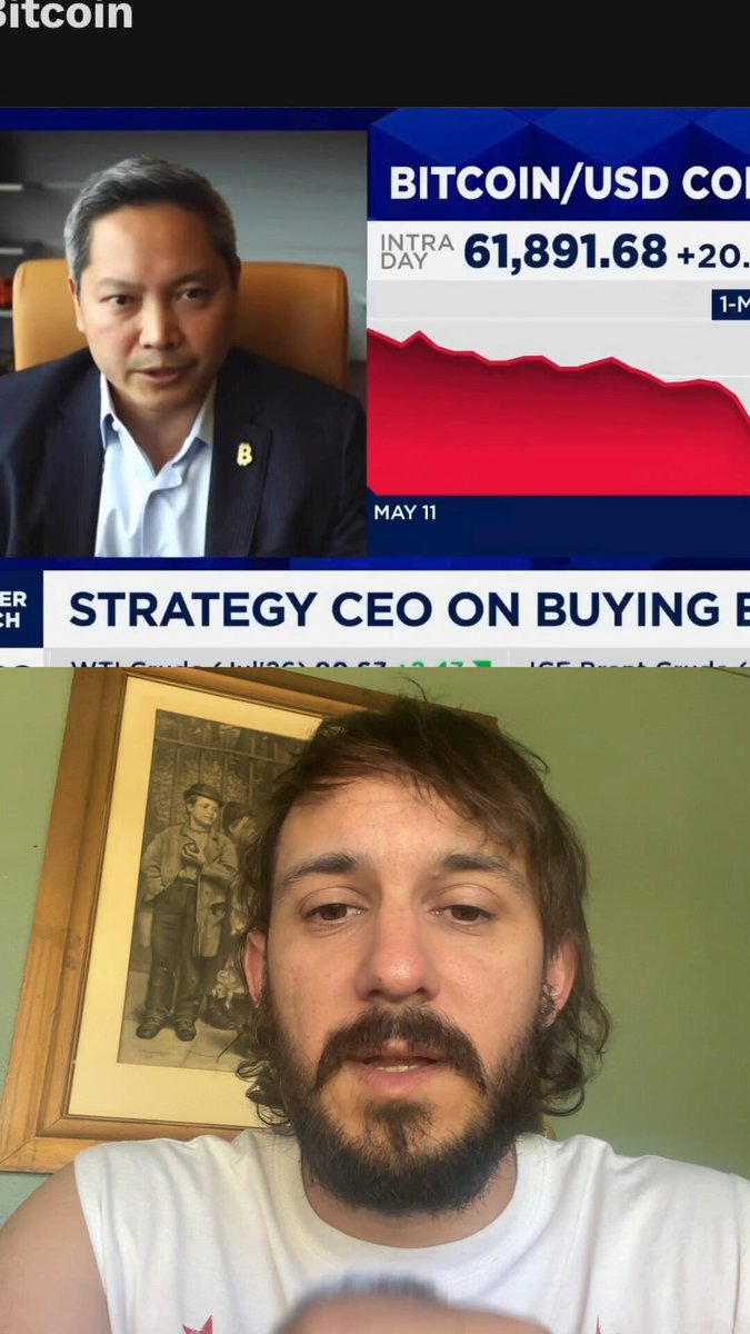 The image shows a man wearing a white shirt, sitting at a desk with a computer screen displaying two different news articles about Bitcoin. One article is titled "Bits" and the other is titled "USDC". The first article is about the CEO of USDC buying Bitcoin, while the second one is about the company's strategy to hold Bitcoin as part of their investment portfolio.