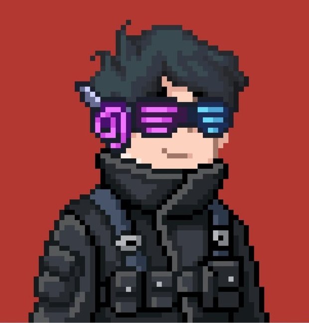 In the image, a man dressed as a character from the video game Pixona GTD appears wearing black clothes and purple glasses with a large "G" on them. The man has his head turned towards the viewer and seems to be looking at us directly. The background of the image is red, which contrasts with the main subject and creates a visually striking effect.