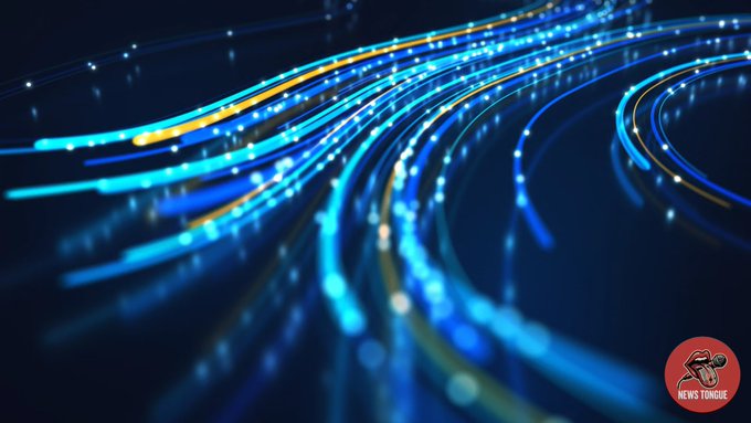 An abstract digital graphic features curved blue and orange light streaks with glowing particles on a dark background, with a red 'NEWS TONGUE' logo in the bottom right corner.