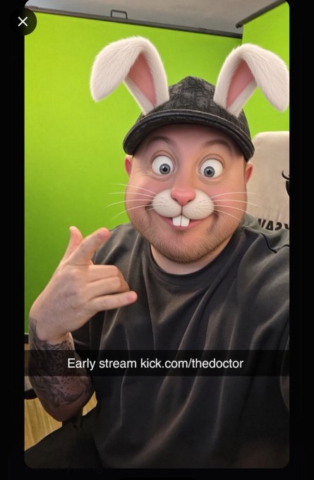 A man uses a bunny rabbit face filter while wearing a black cap and t-shirt, gesturing with his hand and displaying text 'Early stream kick.com/thedoctor'.