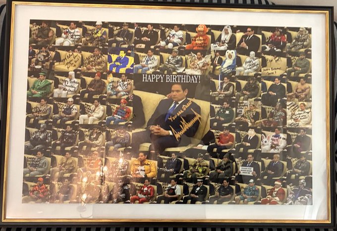 A framed "HAPPY BIRTHDAY!" collage poster featuring numerous signed photos of a seated man surrounded by various sports figures and personalities.