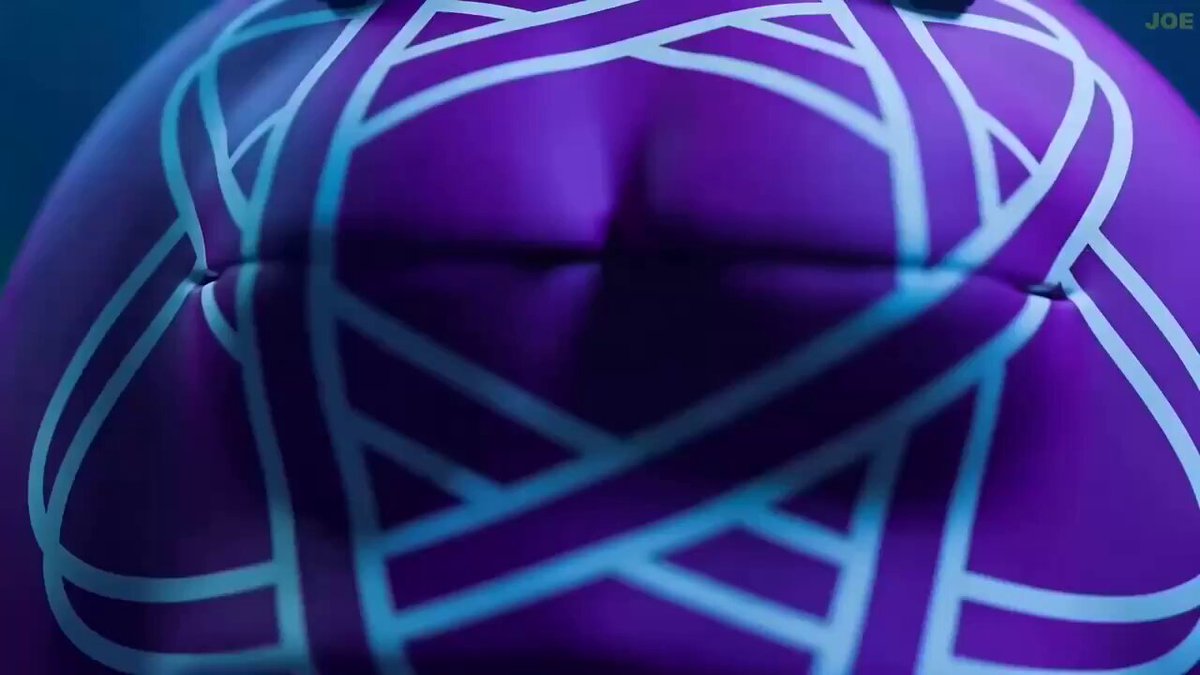 The image shows a close-up view of an object, possibly a purple helmet or a purple shirt with white stripes. The background appears to be dark blue, which contrasts with the bright purple color of the object. There are no texts present in the image, and the focus is solely on the object itself.