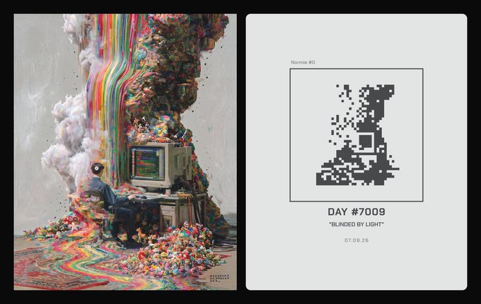 An artwork featuring a person at a computer desk surrounded by a colorful explosion of pixel art, alongside a grid labeled 'Nommie #0', 'DAY #7009', and 'BLINDED BY LIGHT'.