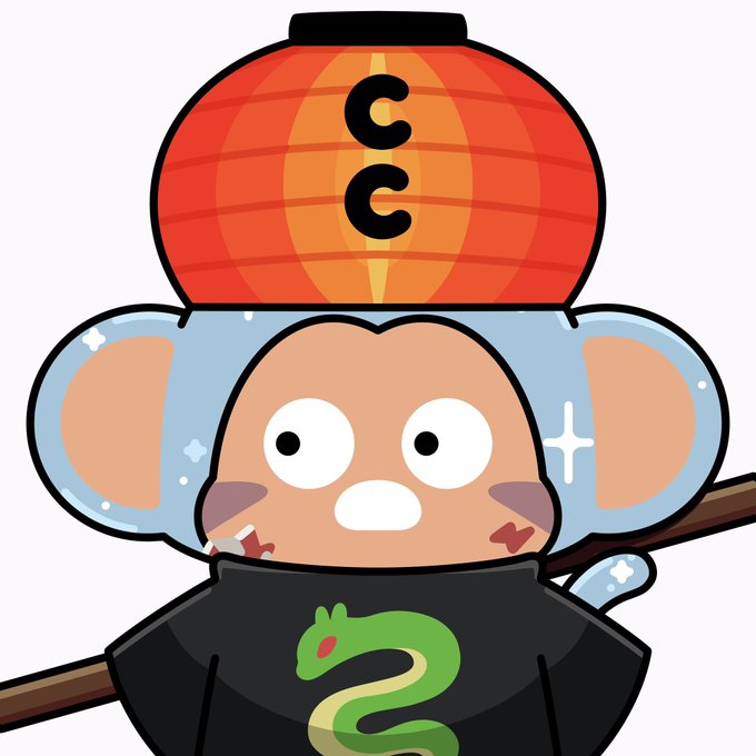 A cartoon monkey character with wide eyes wearing a red cap with a 'CC' symbol and a black shirt featuring a green snake, holding a wooden staff.