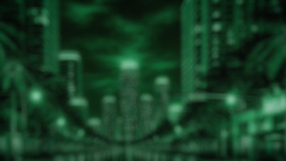 The image shows a city street with tall buildings lining both sides. The scene appears blurry, giving it a dreamy or artistic quality. In the background, there are palm trees that add a tropical feel to the urban setting. The text at the bottom of the image reads "Not your average conference interview @DavidThaDegen joined Tim Stanyakin, Head of Growth at @ChangeNOW_io , for a conversation on the platform's growth, what ChangeNOW does, and what'S next; all from the driver's seat of a Ferrari".