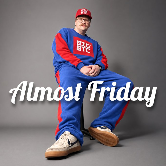 A promotional photo of a man in a blue and red BTS tracksuit, red cap, and glasses, seated with text 'Almost Friday' overlaid.