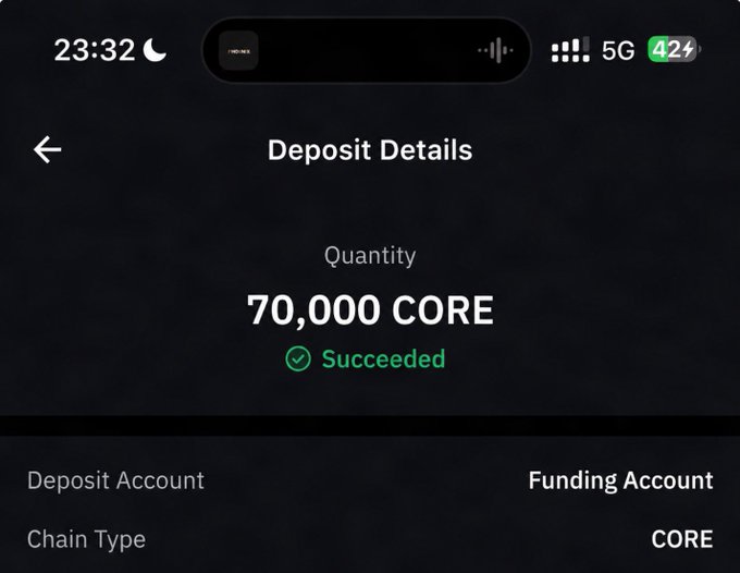 The image displays a smartphone screen with an alert from GM, $CORE Believers!, showing that it's just a small part of preparing for a month-long journey towards @Coredao_Org#ROADTO100. The message states that the bookmarking and thanks at the end are part of this preparation process, which involves a $1 book to @Coredao_Org#ROADTO100 mindset.