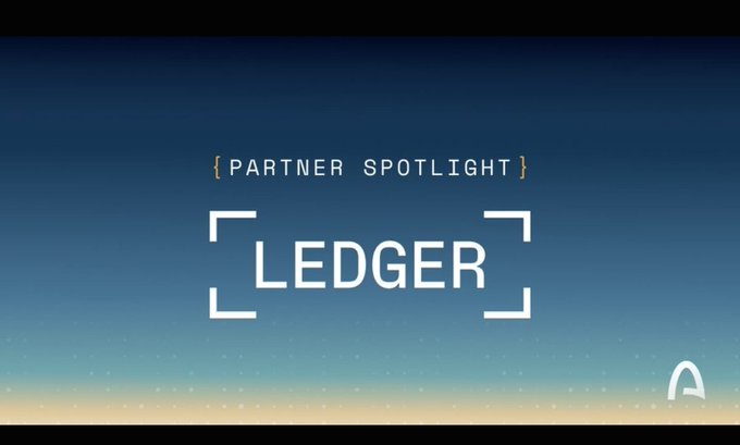 A graphic with a blue gradient background displaying 'PARTNER SPOTLIGHT' above the 'LEDGER' logo in white.