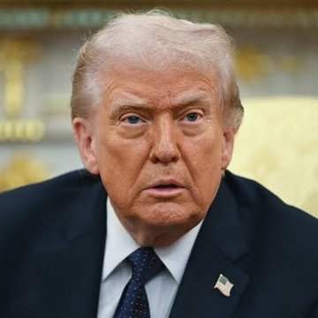 The image features a man dressed in a suit, sitting down with his head tilted slightly to one side as he looks at something off-camera. The caption below the photo reads "President says it's 'time to audit' #Fortknox $#Gold reserves but Russia?". This suggests that there might be some political or economic discussion related to the image of the man in a suit, possibly involving the President and the reserves of Fort Knox.