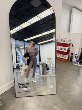 The image shows a person taking a mirror selfie wearing the "Puppies & Yoga" outfit, which ties into the post's theme by potentially showcasing branded or original content that could be part of the Web3 original content rewards program being promoted.