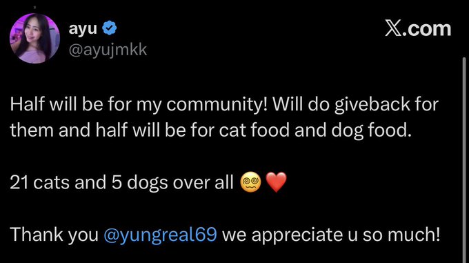 The image shows a tweet from verified user @ayujmkk (ayu) on X.com stating that half of received funds will go toward a community giveaway while the other half will purchase cat food and dog food for her 21 cats and 5 dogs, thanking @yungreal69 for the donation. This response directly answers the accompanying post's request for a Solana wallet address by explaining how the funds will be used across her pets and community.