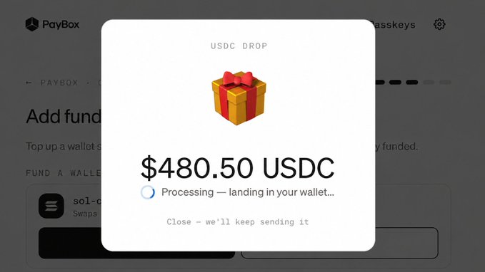 A screenshot of the PayBox app showing a USDC drop notification for $480.50 USDC, with a message that the funds are "Processing — landing in your wallet," confirming the receipt mentioned in the post.