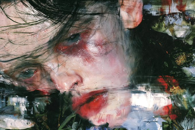 An expressive, painterly portrait of a face with reddish skin tones, dark hair, and what appears to be flowers or abstract elements partially obscuring the lower portion.