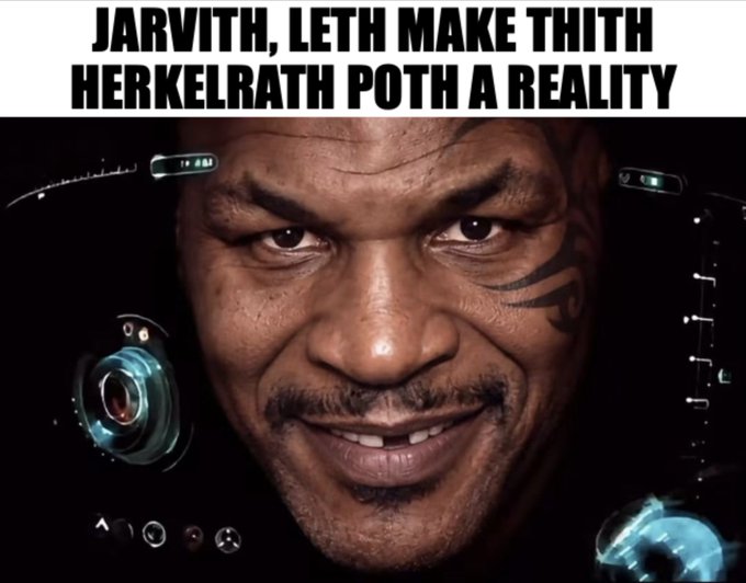 A meme featuring Mike Tyson with futuristic visor elements, captioned with garbled text: 'JARVITH, LETH MAKE THITH HERKELRATH POTH A REALITY'.
