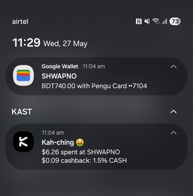 The image shows a phone screen displaying two emails, one from an unknown sender named "Kah-ching" with a funny face, and another email from an unknown sender named "Shwapno" that appears to be advertising a payment method for pengu cards. The emails are in black text against a white background on the phone's display.