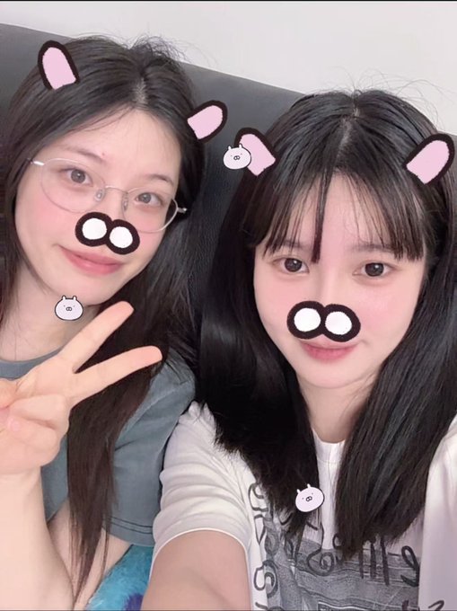 Two young women pose for a close-up selfie, both wearing cute AR filters that add pink cat ears, black mouse noses, and whisker dots over their mouths, with the woman on the left flashing a peace sign. The playful, casual vibe of the image contrasts with the post's lament about missing yesterday's Eurovision results—particularly Norway's elimination—while enjoying a fun Sunday out, suggesting a lighthearted "sorry I forgot to report the news" moment.