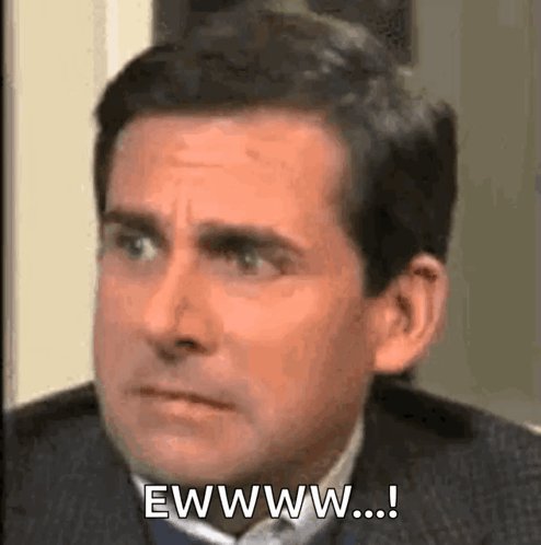 The image features a man with brown hair wearing a suit, looking at something off-camera while reading an exclamation point. Below him, there's text that reads "Ewwwwww...!" The caption also includes the words "sun mode". This suggests that the photo was taken in bright sunlight and has been edited to include this exclamation point for emphasis or to convey a specific mood or message.