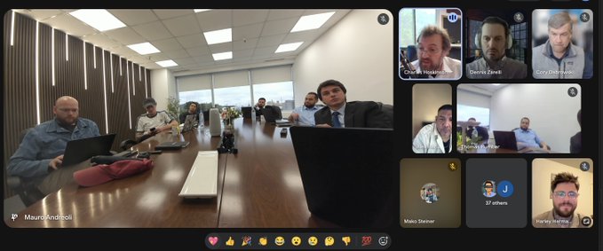 A video conference screenshot showing a main view of a meeting room with user 'MauroAndreoli' and a sidebar displaying multiple participants including 'Deividas Zilevskis', 'Česlav', 'Rokas', 'Matas Sterner', and 'Harley'.