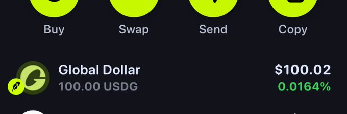 A dark-mode cryptocurrency app screenshot showing action buttons Buy, Swap, Send, Copy, and a 'Global Dollar' holding of 100.00 USDG valued at $100.02 (0.0164%).