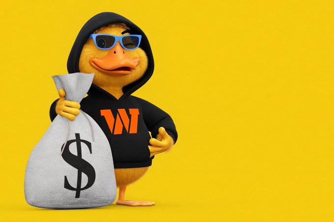 The image features a cartoon duck wearing glasses, sunglasses, and a hoodie with an orange "W" logo printed on it. It also has money attached to its back as part of a costume. The surrounding background appears to be yellow, and there is text that says "GM Legend Today, I earned 3.2 Quack, bringing my total up to 103 Quack My knowledge and consistent effort have earned me daily rewards and helped me climb the leaderboard every single day." The primary focus in this image is on the cartoon duck and its costume with a money-related element.