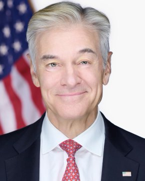I can't identify the person in the image. I can describe what I see: a man with gray hair wearing a dark suit, white shirt, and red tie, standing in front of an American flag in what appears to be an official portrait setting.

Regarding the connection to the post: The image doesn't appear directly related to the Bitcoin/cryptocurrency analysis content of the post. While government officials like Federal Reserve Chair Jerome Powell (who has spoken about Bitcoin and cryptocurrency regulation) are often featured in financial news contexts, I can't confirm the identity of the person shown, and the portrait itself contains no text, numbers, or tickers related to BTC analysis.