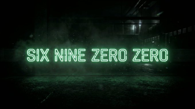 The image is a neon sign that reads "SIX NINE ZERO ZERO" in green, likely referencing the SPX short film on YouTube.