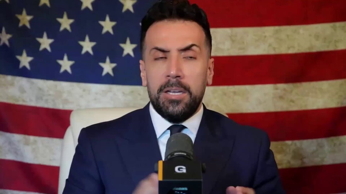 The image features a man wearing a suit, sitting behind a microphone, giving a speech or interview. He appears to be dressed for an important event or occasion, possibly related to politics or public speaking. The background of the image includes an American flag, which suggests that this could be taking place in a country with a strong connection to its national identity and history.

The post reads "Go into Midnight City with David", indicating that there might be some sort of political event or gathering happening at night. This implies that the man speaking is likely addressing an issue or sharing his thoughts on a topic related to politics, lawmaking, or public policy. The use of the word "David" in the post could potentially refer to a specific individual who has been involved in such events before, or it might be a reference to a character from a book, movie, or TV show that takes place at night.