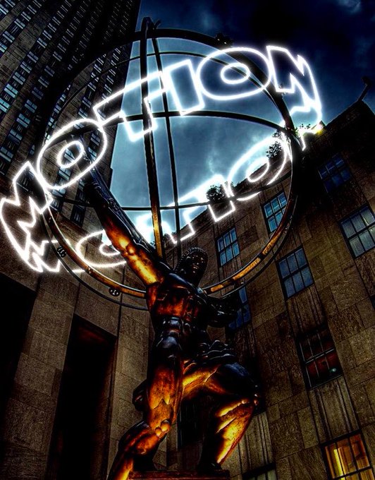 A dramatic low-angle shot of the iconic Atlas statue at Rockefeller Center with a glowing neon 'MOTION' sign arcing through the sky above.
