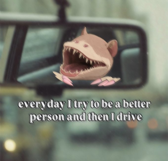 A rearview mirror reflects a meme creature with a wide, toothy mouth and small horns, accompanied by the caption 'everyday I try to be a better person and then I drive.'