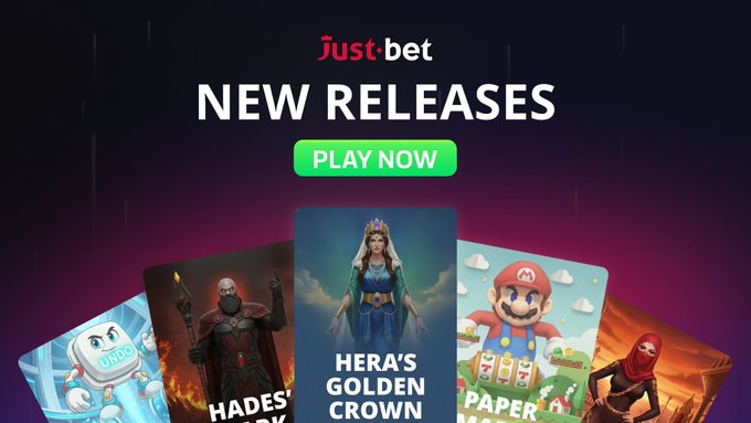 A 'Just bet' advertisement for 'NEW RELEASES' featuring game thumbnails including 'HADES' and 'HERA'S GOLDEN CROWN' with a green 'PLAY NOW' button.