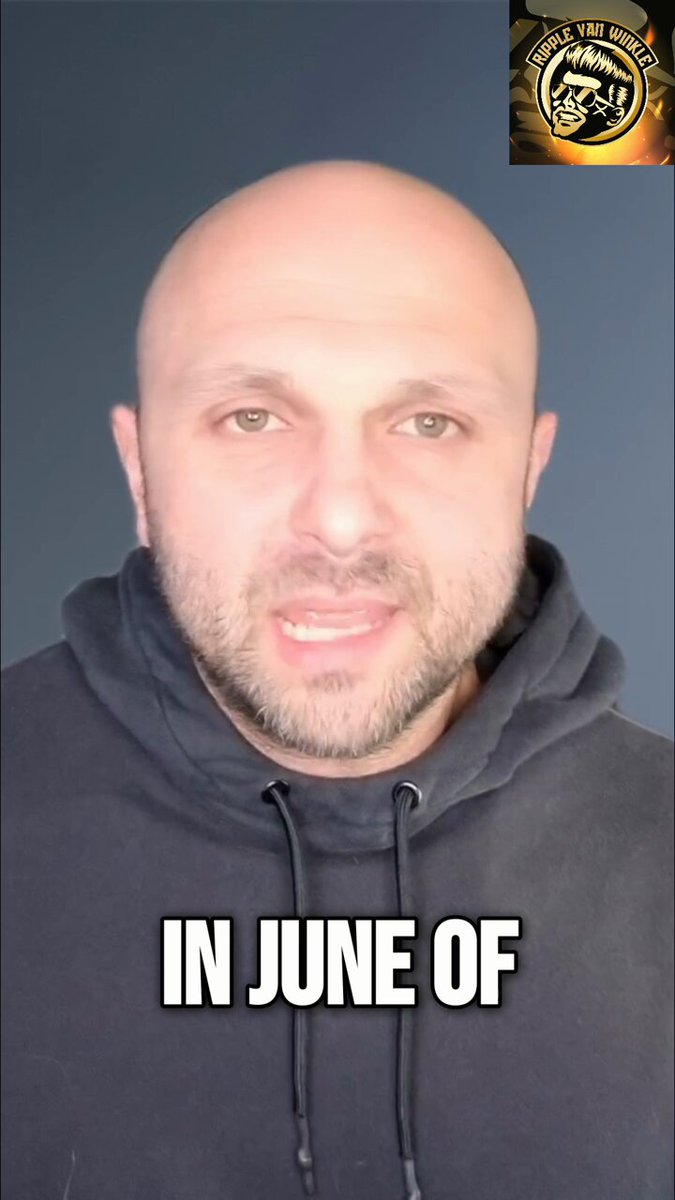 The image features a bald man wearing a black hoodie, with the caption "In June of this year" written below his face. The text suggests that there was some sort of public statement or event related to cryptocurrency, possibly involving the CEO of a major bank. However, it is unclear whether the post is genuine or if it's just a joke or meme about the CEO and the cryptocurrency world.