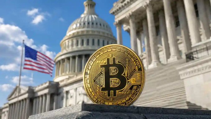 A physical Bitcoin coin placed in front of the U.S. Capitol building with an American flag visible, suggesting themes of cryptocurrency regulation or government policy.