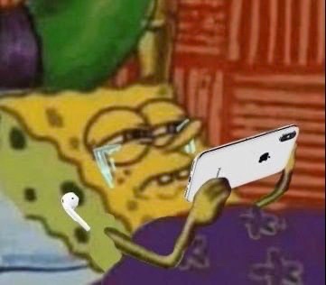 A low-resolution image of the cartoon character SpongeBob SquarePants crying while holding a white smartphone, appearing to look at something emotional on the screen.
